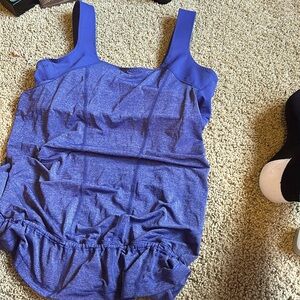 Lululemon Sz 12 top w/built in bra. Draw strings on bottom half. Bluish purple